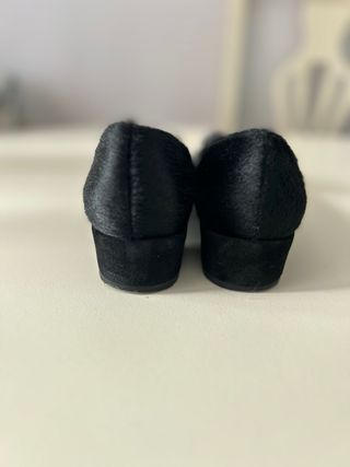 Bailarinas pelo y plumas negras