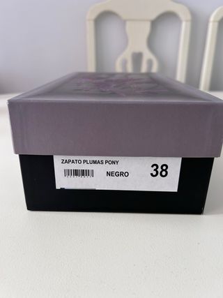 Bailarinas pelo y plumas negras