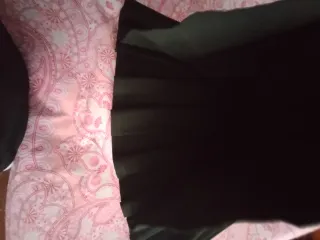 Faldas 
Bershka negra plisada y blanca 