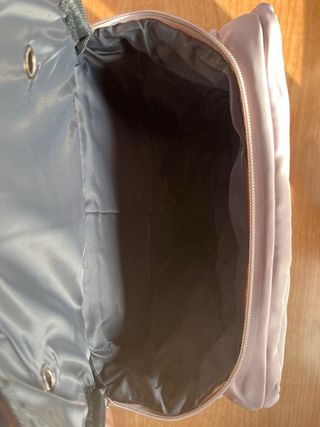 Mochila de viaje beige y rosa