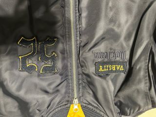 Bomber ragazzo blu con toppe