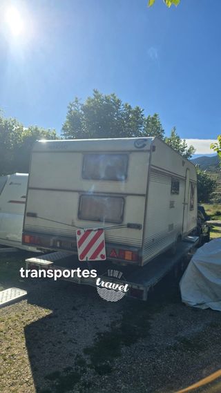 Grúa porte transporte caravanas,coches,remolques.