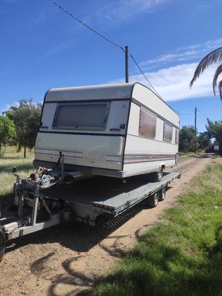 Grúa porte transporte caravanas,coches,remolques.