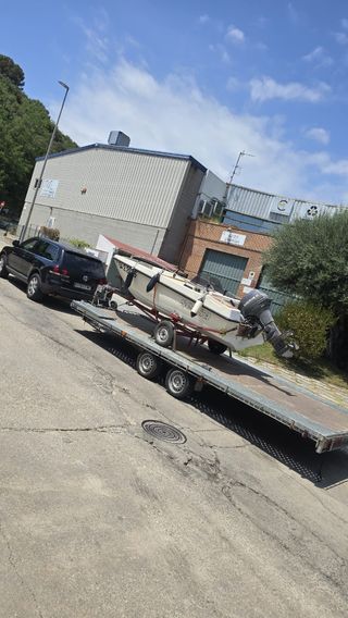 Grúa porte transporte caravanas,coches,remolques.