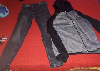 Sudadera gris y negra con capucha