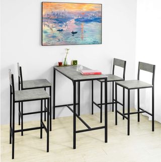 Conjunto de mesa y sillas altas