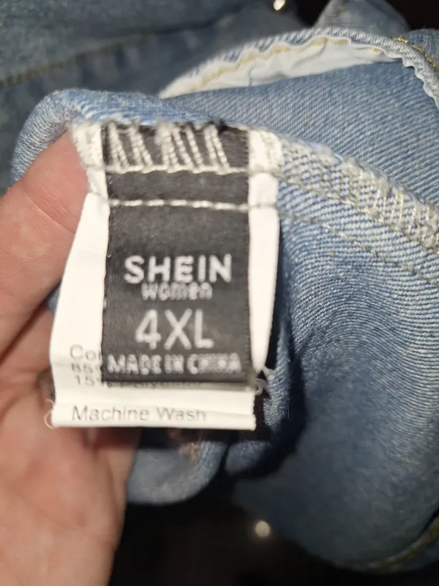 Chaqueta larga vaquera desgastada