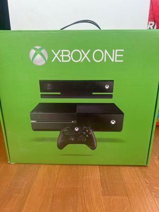 Xbox One con mando y juegos