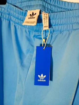Pantalones Adidas Originals celestes