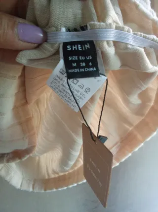 Vestido beige de cuello alto