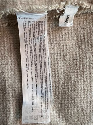 Manta de algodón beige con flecos de Mango