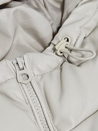 Chaleco acolchado mujer beige