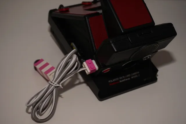 Pulsante di scatto per Polaroid SX-70