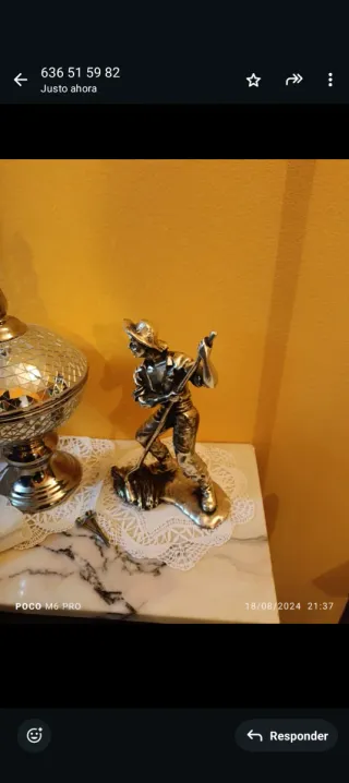 Figura de plata de granjero