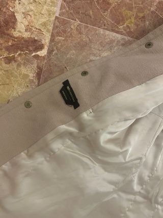 Cappotto beige con pelliccia marrone