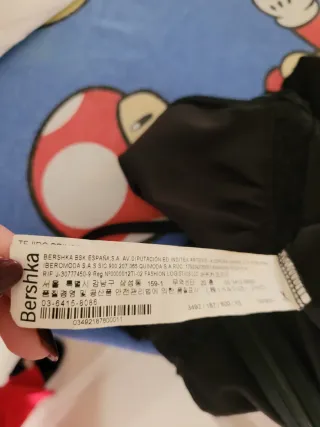 Tuta elegante con pizzo nero