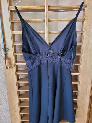 Tuta elegante con pizzo nero