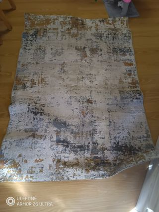 Alfombra estilo abstracto beige y dorado