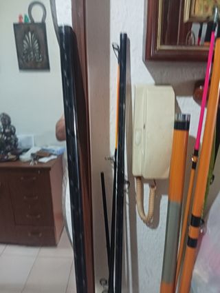 2 cañas de pescar y funda