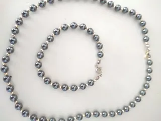 Collar y Pulsera de Perlas Negras y Doradas