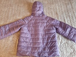 Piumino viola con cappuccio