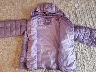 Piumino viola con cappuccio