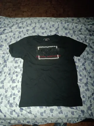 Camiseta Deportiva Mackenzi Negra de niño 