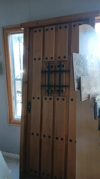 Puertas de calle madera con reja