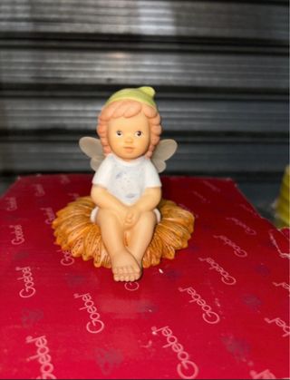 Goebel Elfo seduto su Gerbera