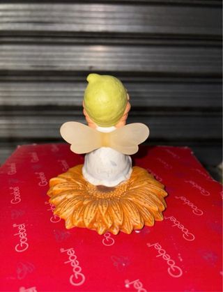 Goebel Elfo seduto su Gerbera