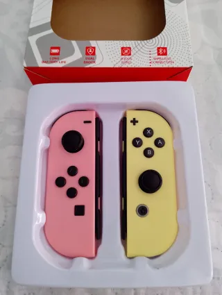 Mandos Joycon Nintendo Switch Rosa y Amarillo.