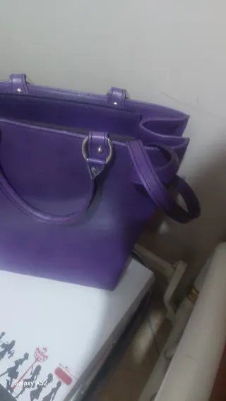 Borsa vera pelle viola,estremamente bella e alla m