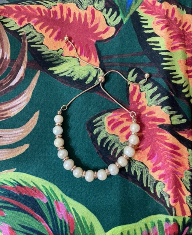 Bracciale perle dorate regolabile