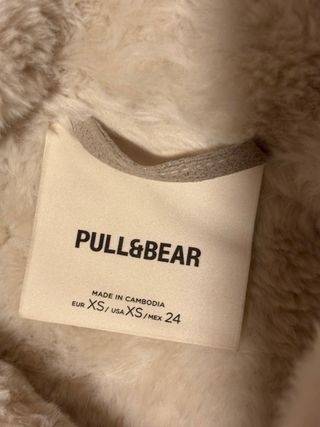Chaqueta de pelo beige y blanco
