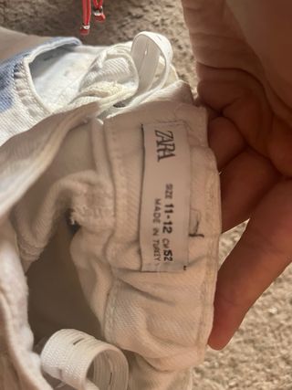 Pantalón niña Zara blanco con manchas azules