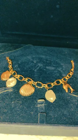 Pulsera diseño perlas acero dorado