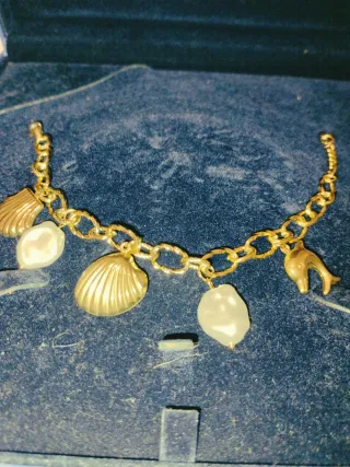 Pulsera diseño perlas acero dorado