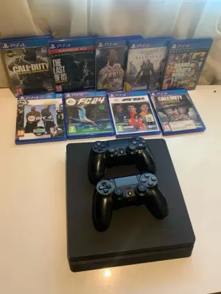 PS4 (PlayStation 4) con 7 juegos