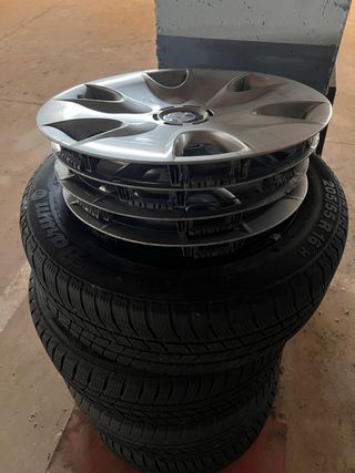 4 Llantas BMW 205/55 R16 H con Tapacubos