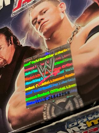 WWE Smackdown Animotion Raw 
Caja de 24 Sobres