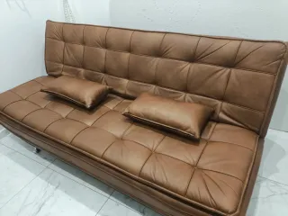 Divano letto in ecopelle marrone