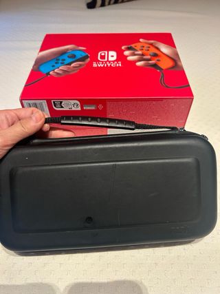 lote Nintendo Switch + Mando, Funda y 9 juegos 