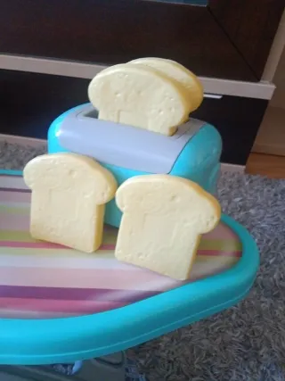 Tabla planchar con plancha, tostadora y batidora