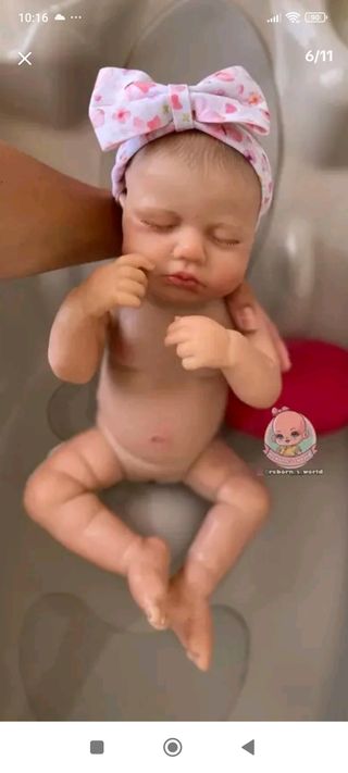 Muñeca de vinilo realista