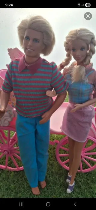 Famiglia Barbie con altalene e scivolo