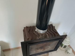 Chimenea hierro fundido con puerta cristal