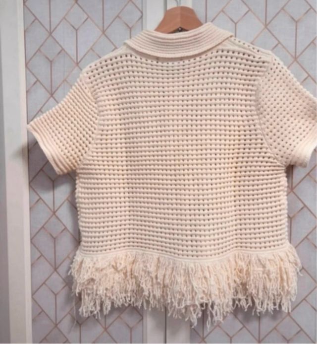 Cárdigan de punto con flecos