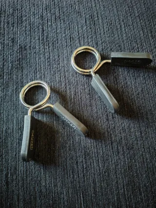 Abrazaderas para barra de pesas
