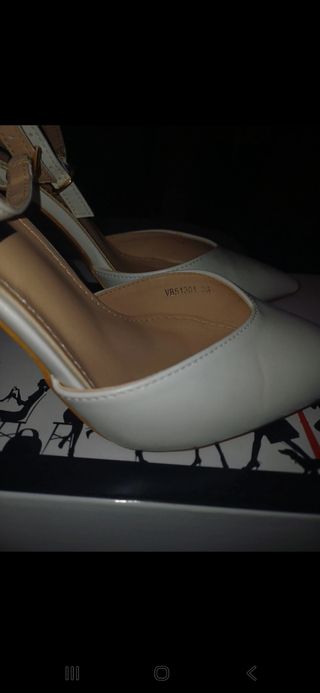 Décolleté bianche con cinturino