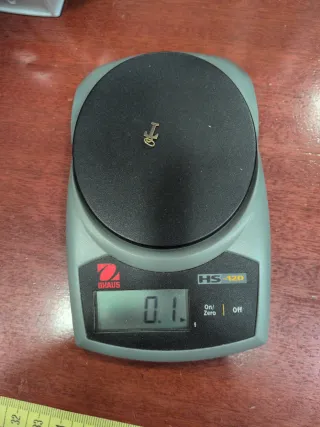 Mini colgante letra T Oro